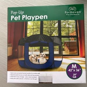 Pop up play pen. 42x36x29 inches. Blue with black top.